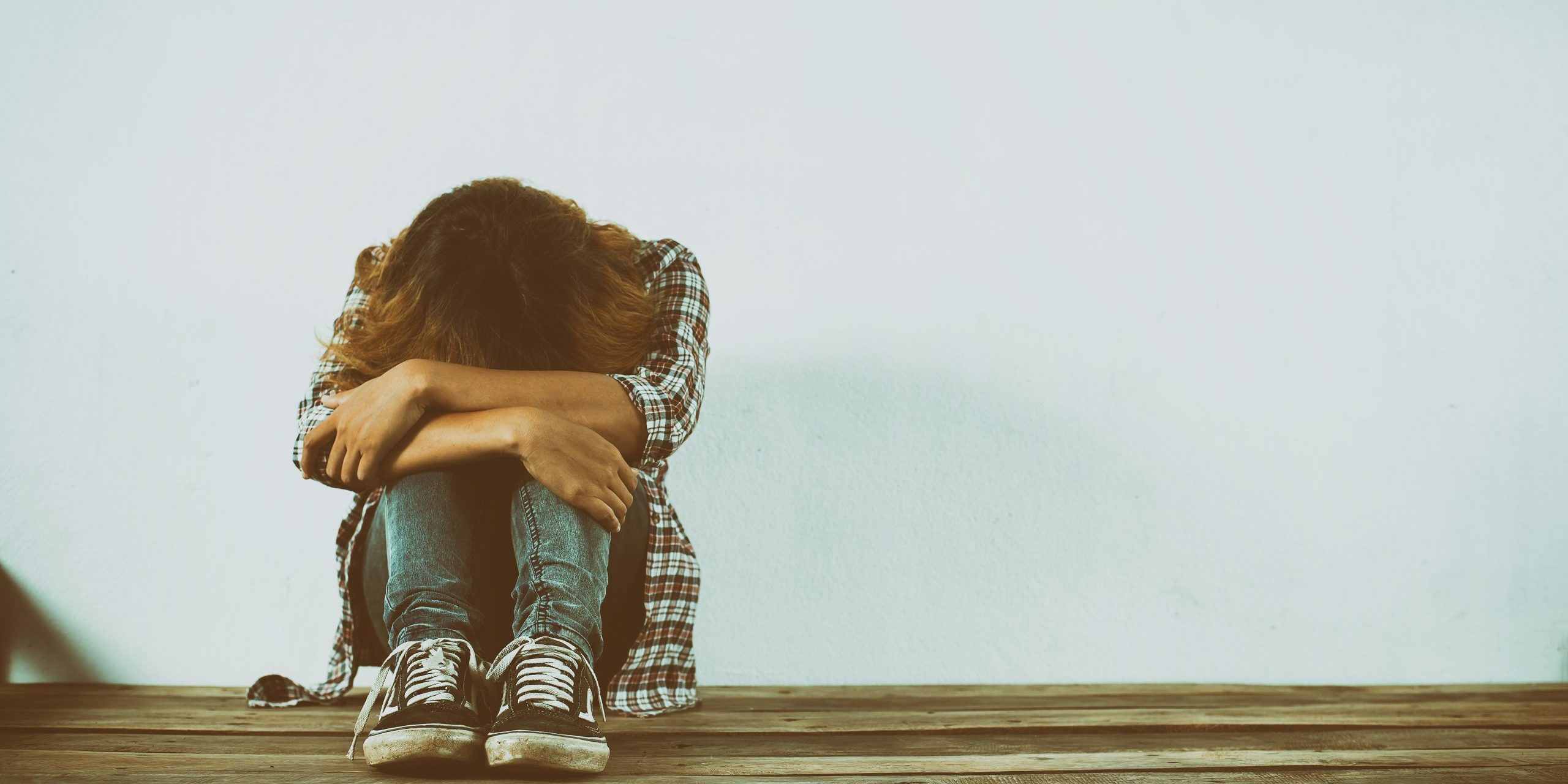 Sad woman hug her knee,nobody